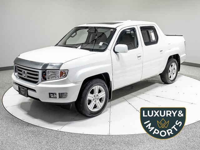 White 2013 Honda Ridgeline Pickup Truck Four-Wheel Drive 5-Speed Automatic