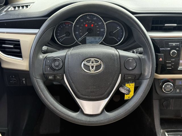 2015 Toyota Corolla LE Brown at Texan Dodge Chrysler Jeep Ram