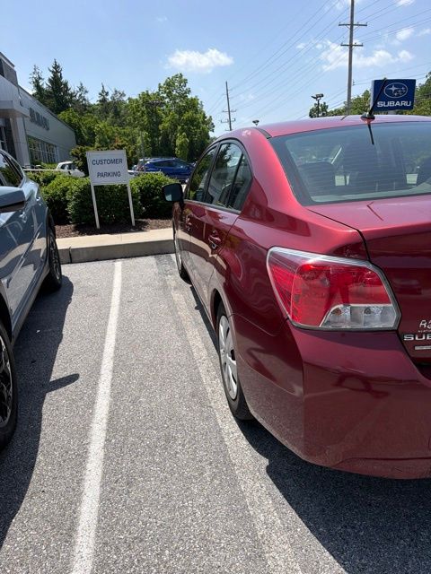 2014 Subaru Impreza 2.0i Red at Subaru and VW of Moon Township