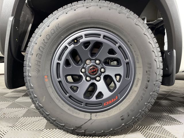 2025 Glacier White Nissan Frontier PRO-X RWD Truck