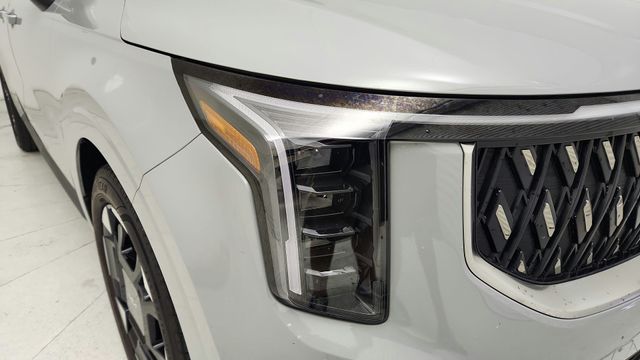 2025 Kia Carnival EX White at Parkway Family Mazda
