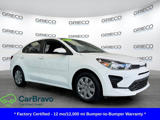 Clear White 2023 Kia Rio Sedan Front-Wheel Drive Continuously Variable Transmission