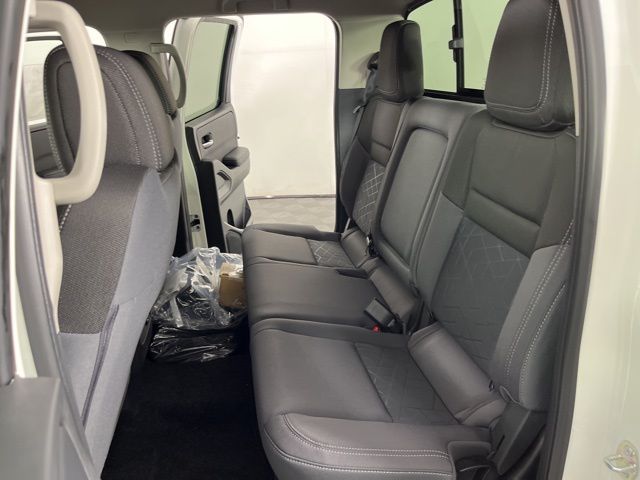 2025 Glacier White Nissan Frontier SV RWD Truck