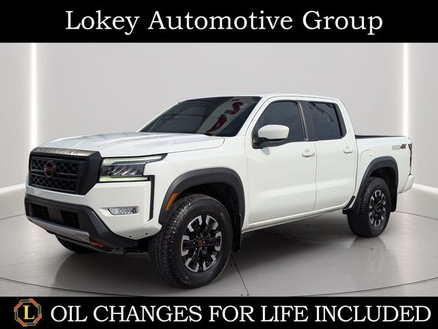 Glacier White 2024 Nissan Frontier Pickup Truck Four-Wheel Drive 9-Speed Automatic Overdrive