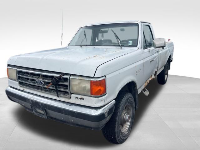 White 1991 Ford F-250 2 Dr XL 4WD Standard Cab LB Pickup Truck Four-Wheel Drive Manual