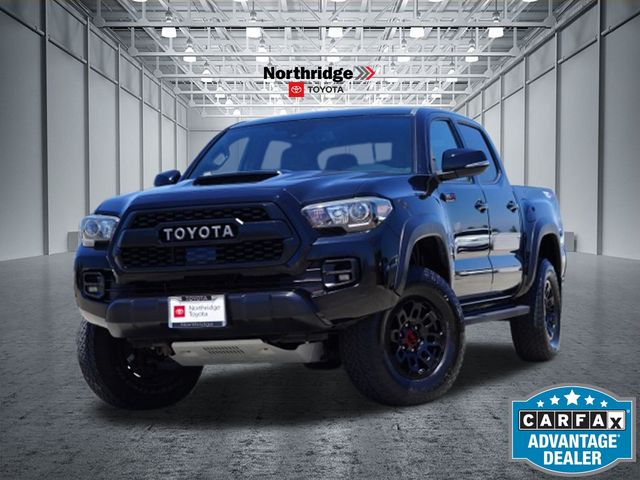 Midnight Black Metallic 2018 Toyota Tacoma Pickup Truck Four-Wheel Drive 6-Speed Automatic