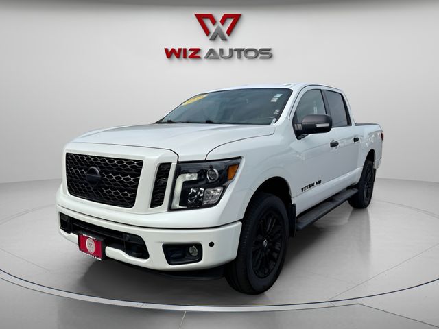 Pearl White Metallic 2019 Nissan Titan Pickup Truck Four-Wheel Drive 7-Speed Automatic