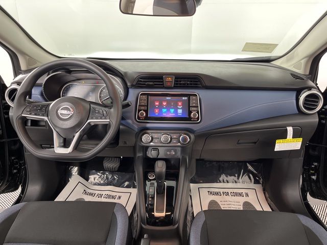 2025 Super Black Metallic Nissan Versa 1.6 SV FWD Sedan