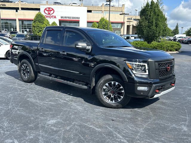 Super Black 2023 Nissan Titan Pickup Truck Four-Wheel Drive 9-Speed Automatic