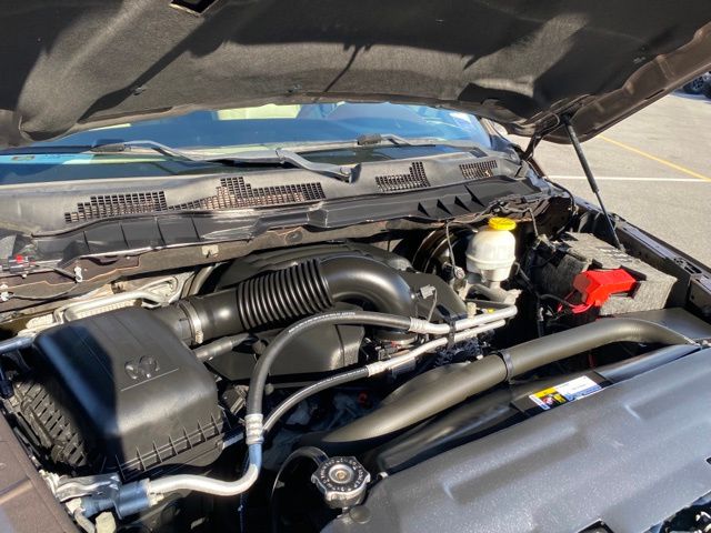 used 2018 Ram 1500 car, priced at $28,627