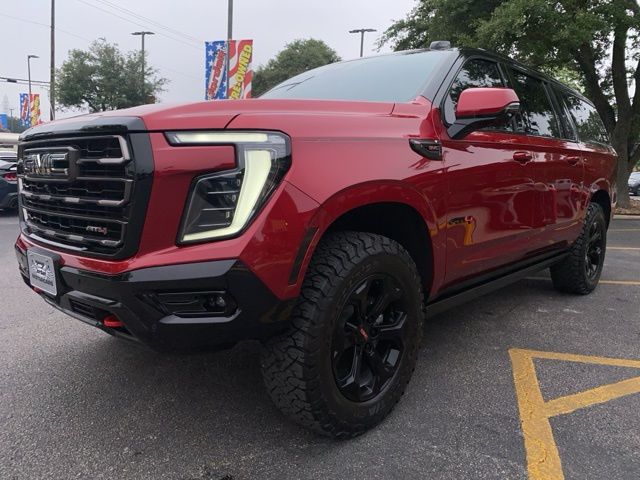 Volcanic Red Tintcoat 2025 GMC Yukon XL AT4 Ultimate 4WD SUV / Crossover Four-Wheel Drive