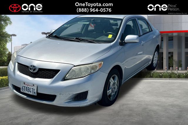 Classic Silver 2009 Toyota Corolla LE Sedan Front-Wheel Drive 4-Speed Automatic