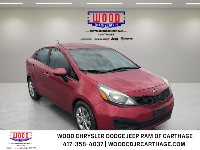 Signal Red 2015 Kia Rio Sedan Front-Wheel Drive 6-Speed Automatic
