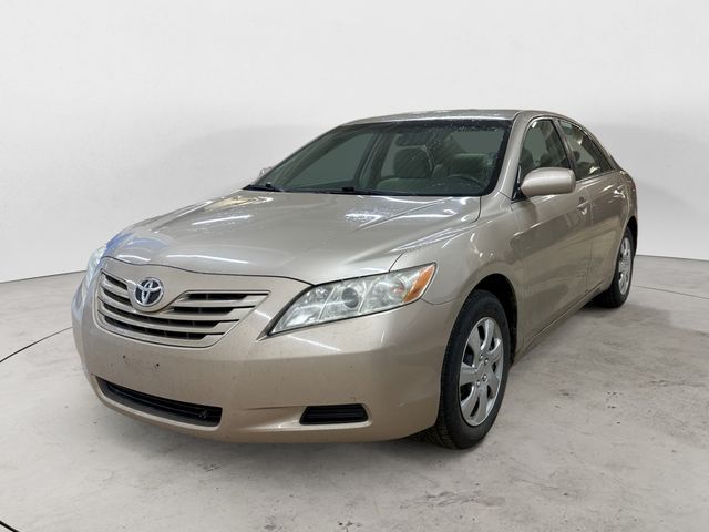 Champagne 2009 Toyota Camry LE Sedan Front-Wheel Drive 5-Speed Automatic Overdrive
