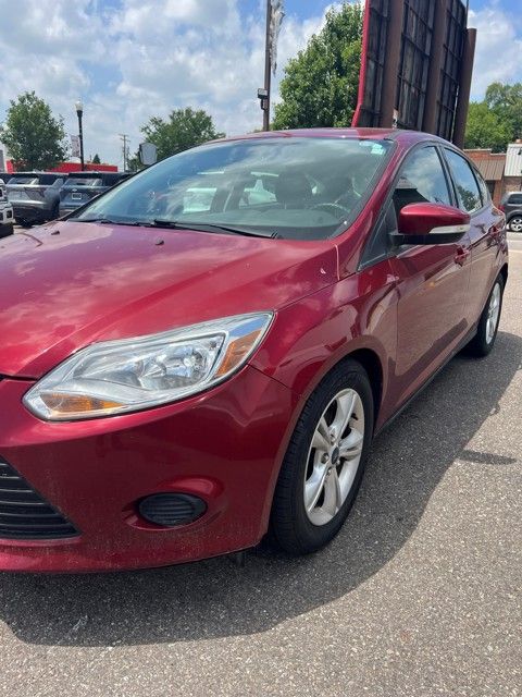 Ruby Red 2014 Ford Focus Hatchback Front-Wheel Drive 6-Speed Automatic