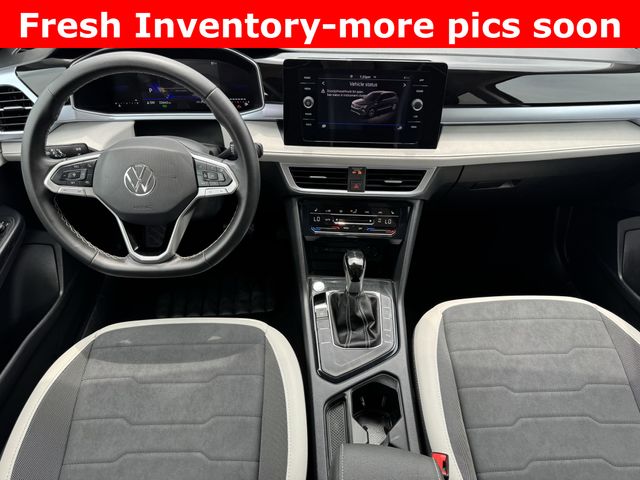 2025 Volkswagen Taos 1.5T SE Black at DeMontrond Automotive Group