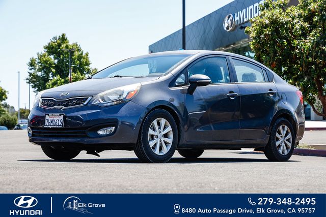 Gray (Platinum Graphite) 2015 Kia Rio Sedan Front-Wheel Drive 6-Speed Automatic