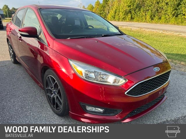 Ruby Red Metallic 2015 Ford Focus Sedan Front-Wheel Drive 6-Speed Automatic