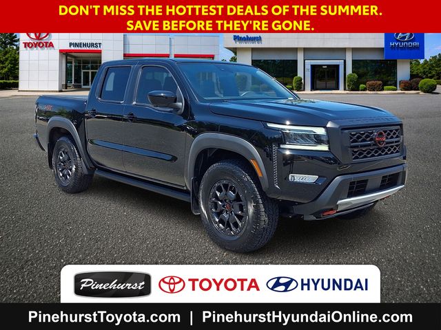 Black 2024 Nissan Frontier Pickup Truck Four-Wheel Drive 9-Speed Automatic Overdrive