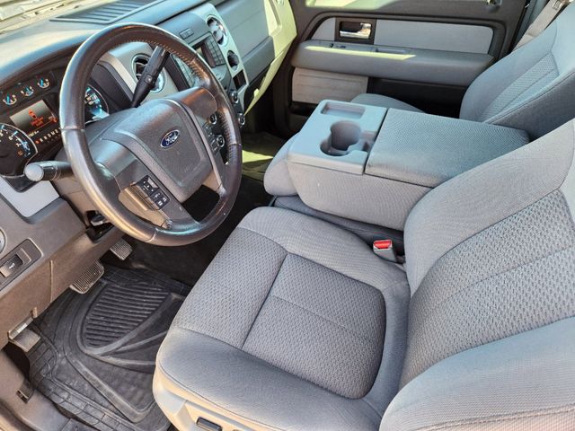 2014 Tuxedo Black Metallic Ford F-150 XLT 4X4 Truck