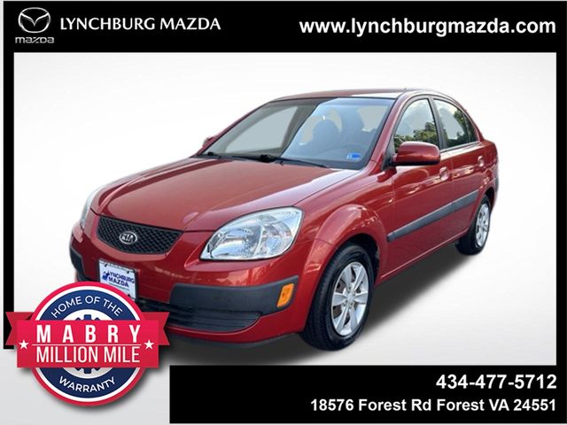 Tropical Red 2008 Kia Rio Sedan Front-Wheel Drive 5-Speed Manual Overdrive