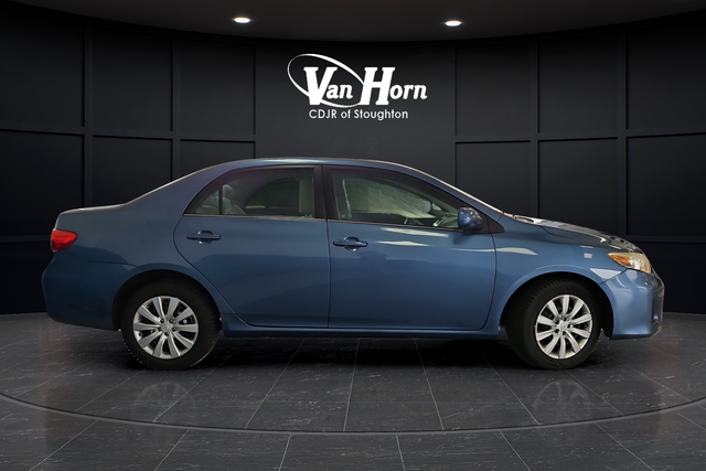 Used 2013 Tropical Sea Metallic Toyota LE image 8