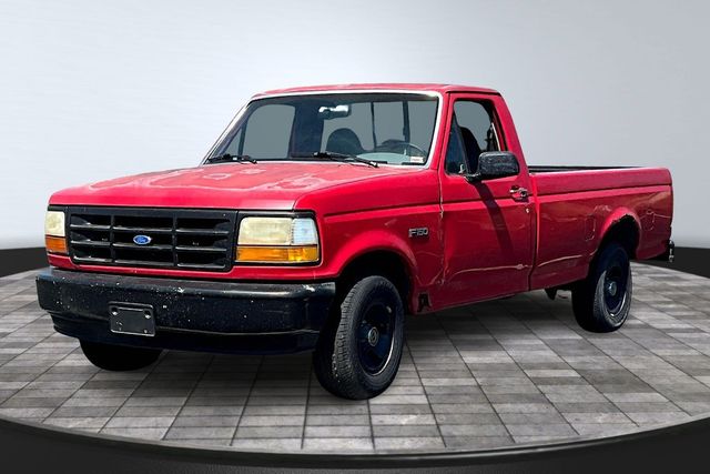 Red 1995 Ford F-150 Pickup Truck