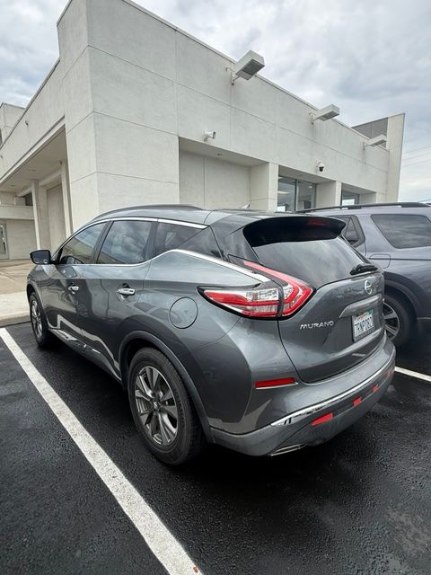 Used 2016 Gun Metallic Nissan SV image 2