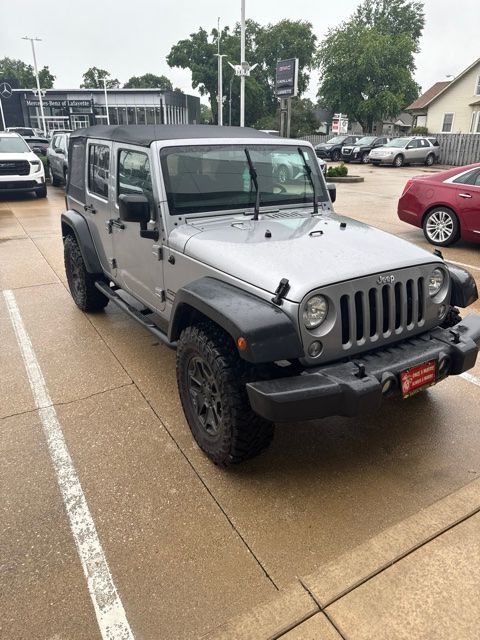 Used 2017 Silver Jeep Unlimited Sport image 3