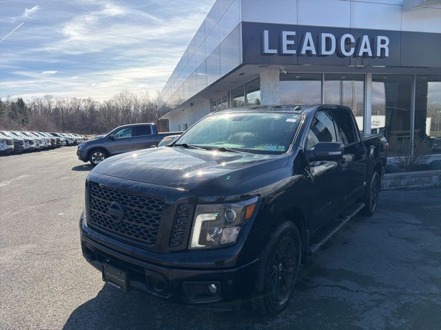 Gray (Magnetic Black Metallic) 2019 Nissan Titan SV Crew Cab 4WD Pickup Truck Four-Wheel Drive 7-Speed Automatic