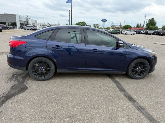 2016 Blue Ford Focus SE FWD Sedan