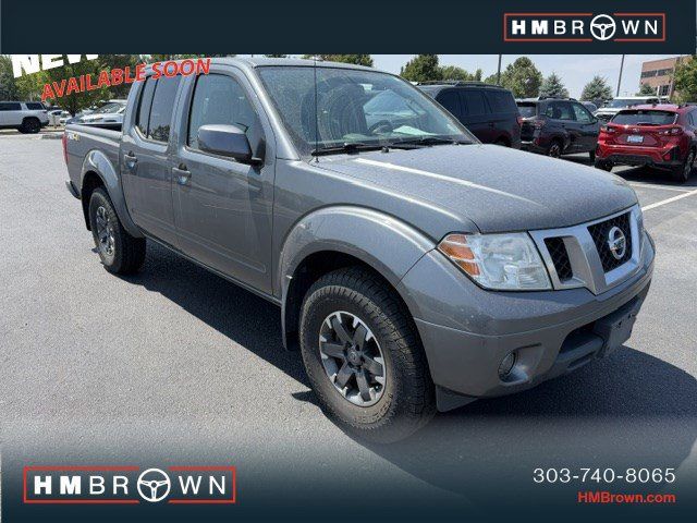 Gray 2016 Nissan Frontier Pickup Truck Four-Wheel Drive 6-Speed Manual Overdrive