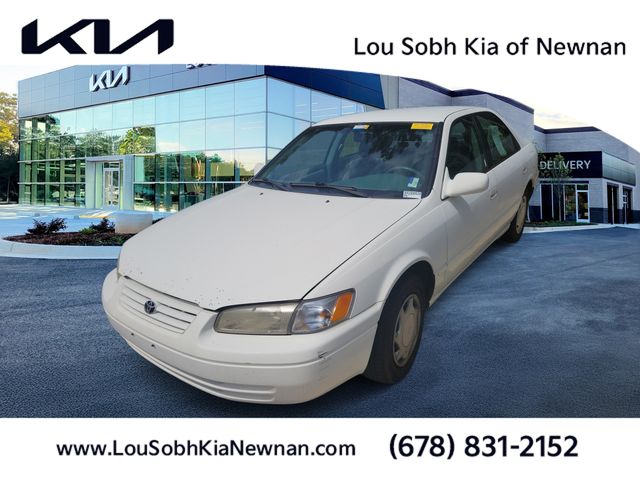 Super White 1999 Toyota Camry Sedan Front-Wheel Drive 5-Speed Manual