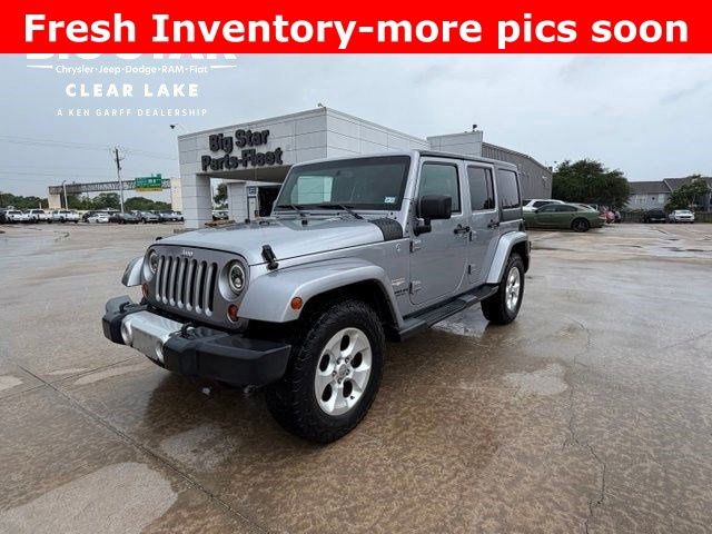 2013 Jeep Wrangler Unlimited Sahara Silver at DeMontrond Auto Country