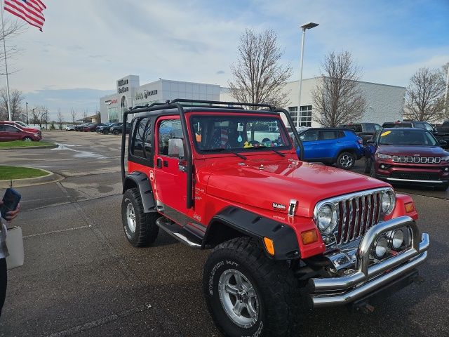 1999 Jeep Wrangler Sport - Flame Red Clear Coat exterior view 3