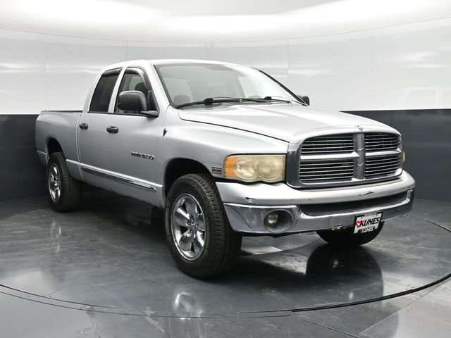 Silver 2005 Dodge RAM 1500 Laramie Quad Cab 4WD Pickup Truck Four-Wheel Drive 5-Speed Automatic