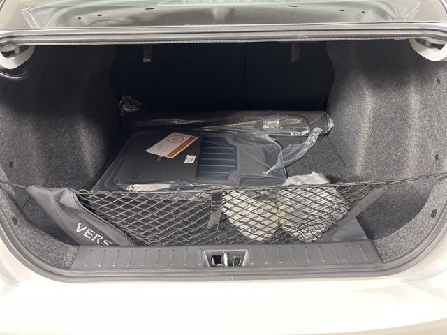 2025 Aspen White Tricoat Nissan Versa 1.6 SR FWD Sedan