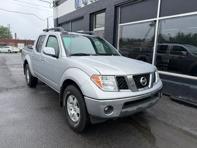 Radiant Silver 2006 Nissan Frontier Pickup Truck Four-Wheel Drive 5-Speed Automatic Overdrive