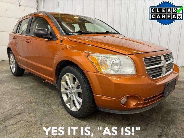 Orange (Mango Tango Pearlcoat) 2011 Dodge Caliber Hatchback Front-Wheel Drive Continuously Variable Transmission