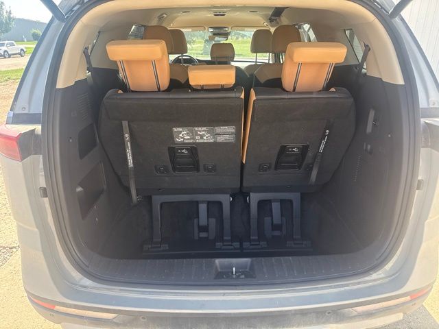 2024 Ceramic Silver Kia Carnival EX FWD Van