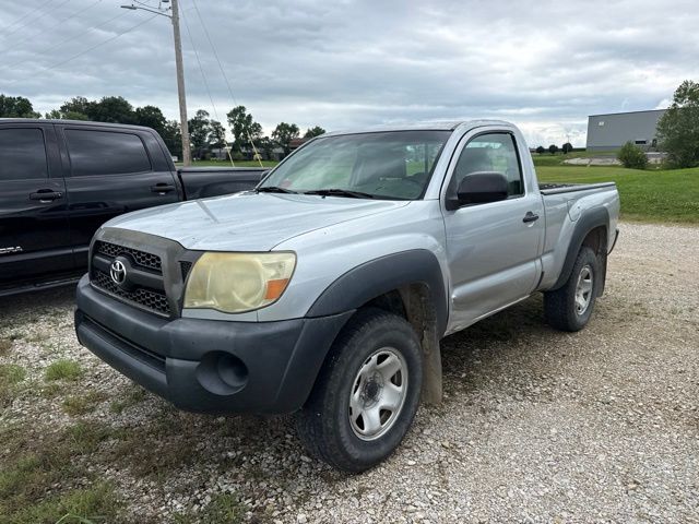 Silver 2011 Toyota Tacoma Pickup Truck Four-Wheel Drive 5-Speed Manual Overdrive