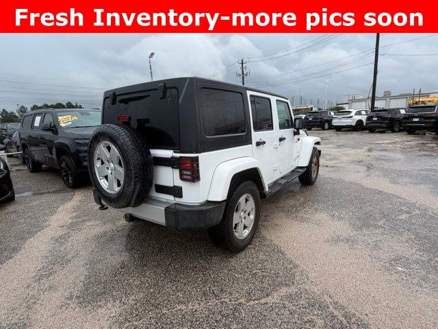 2011 Jeep Wrangler Unlimited Sahara White at Bayshore Chrysler Jeep Dodge Ram