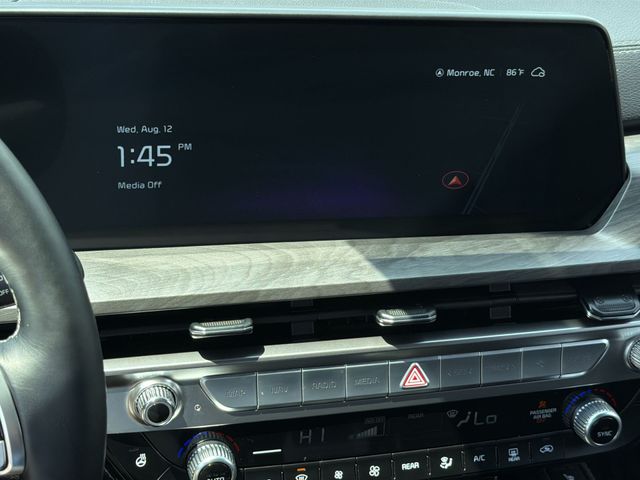 Used 2025 Black Kia EX X-Line image 24