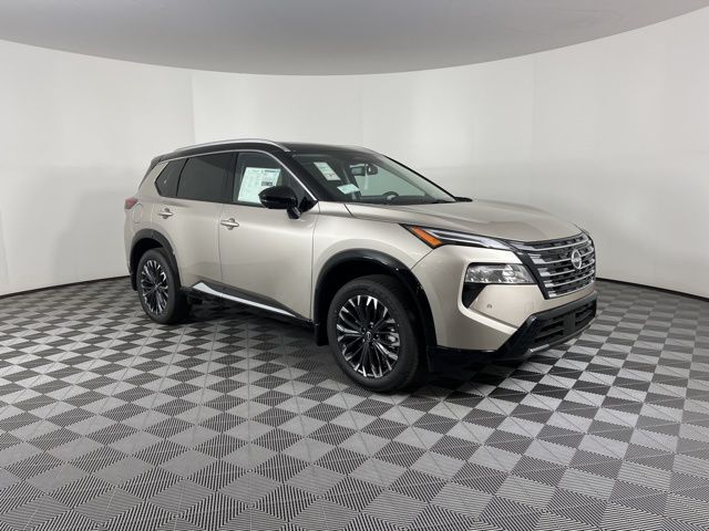 2025 Champagne Silver Metallic/Super Black Nissan Rogue Platinum FWD SUV