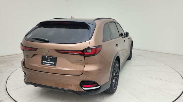New Melting Copper Metallic 2026 Mazda 3.3 Turbo Premium AWD for