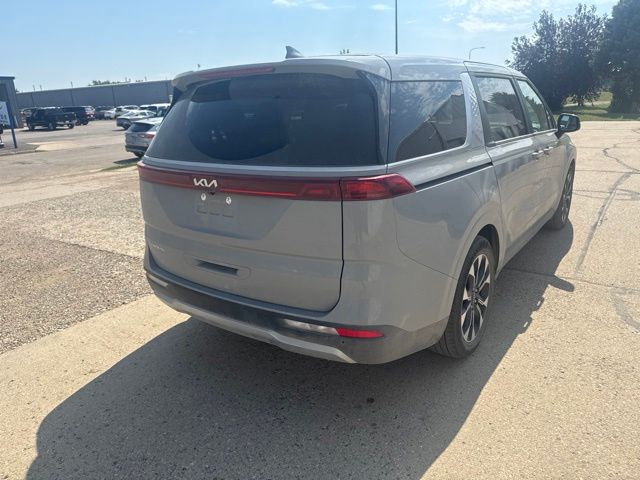 2024 Ceramic Silver Kia Carnival EX FWD Van