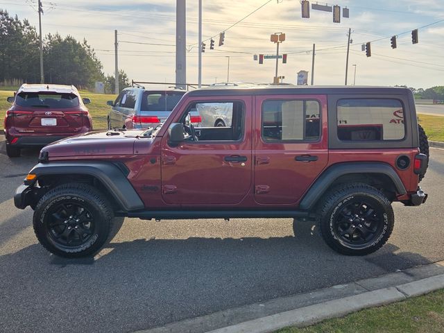 Used 2021 Red Jeep Unlimited Willys image 4