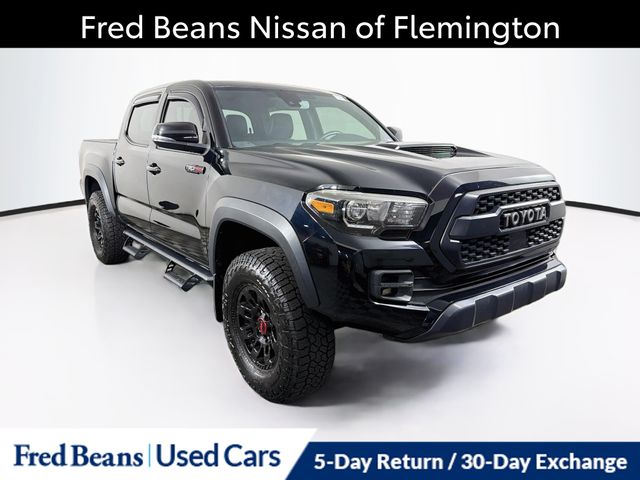 Midnight Black Metallic 2019 Toyota Tacoma Pickup Truck Four-Wheel Drive 6-Speed Manual
