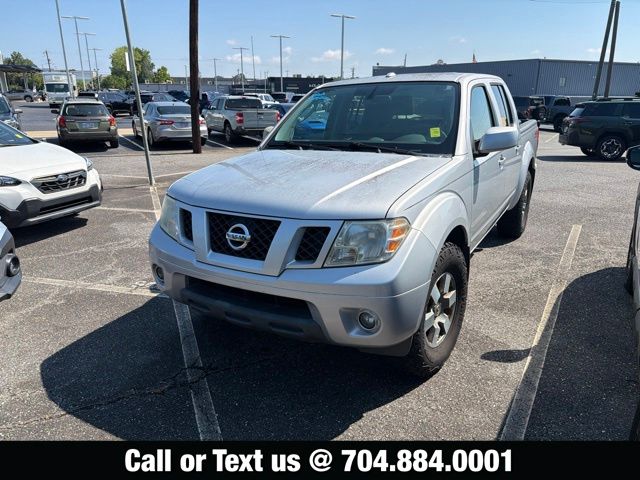 Silver Lightning Metallic 2011 Nissan Frontier Pickup Truck 4X2 5-Speed Automatic Overdrive