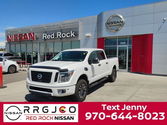 Pearl White 2019 Nissan Titan Pickup Truck Four-Wheel Drive 6-Speed Automatic